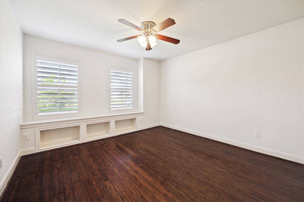 Additional bedroom with shutters.