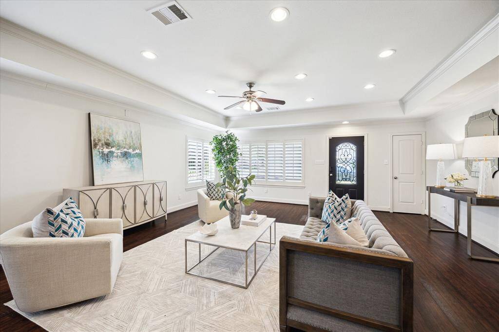 Entrance and bright and inviting living room.