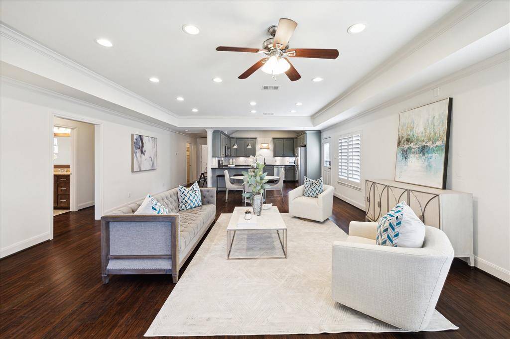 Open-concept living and dining area shown.