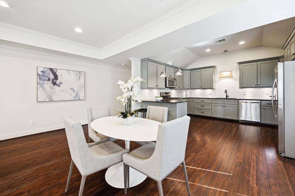 Recently updated kitchen with gray cabinets, stainless steel appliances, and a spacious open layout.