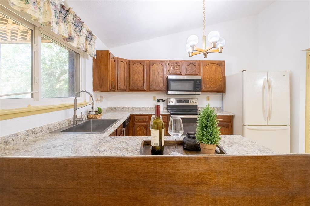 Looking into the kitchen from the family room.