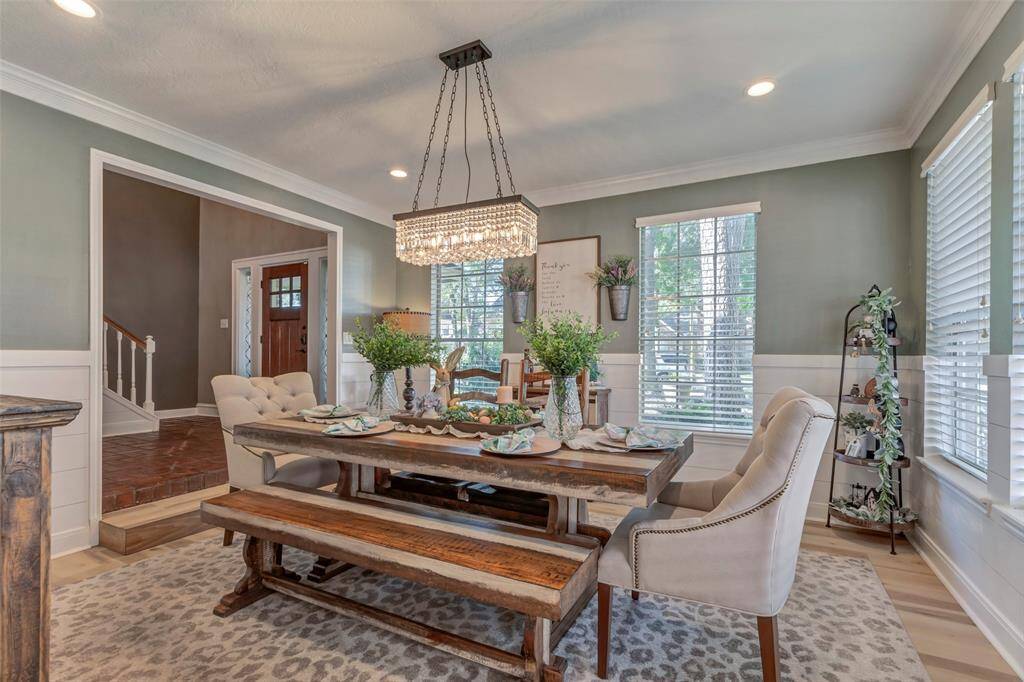Beautiful designer lighting, paint colors and shiplap accent.