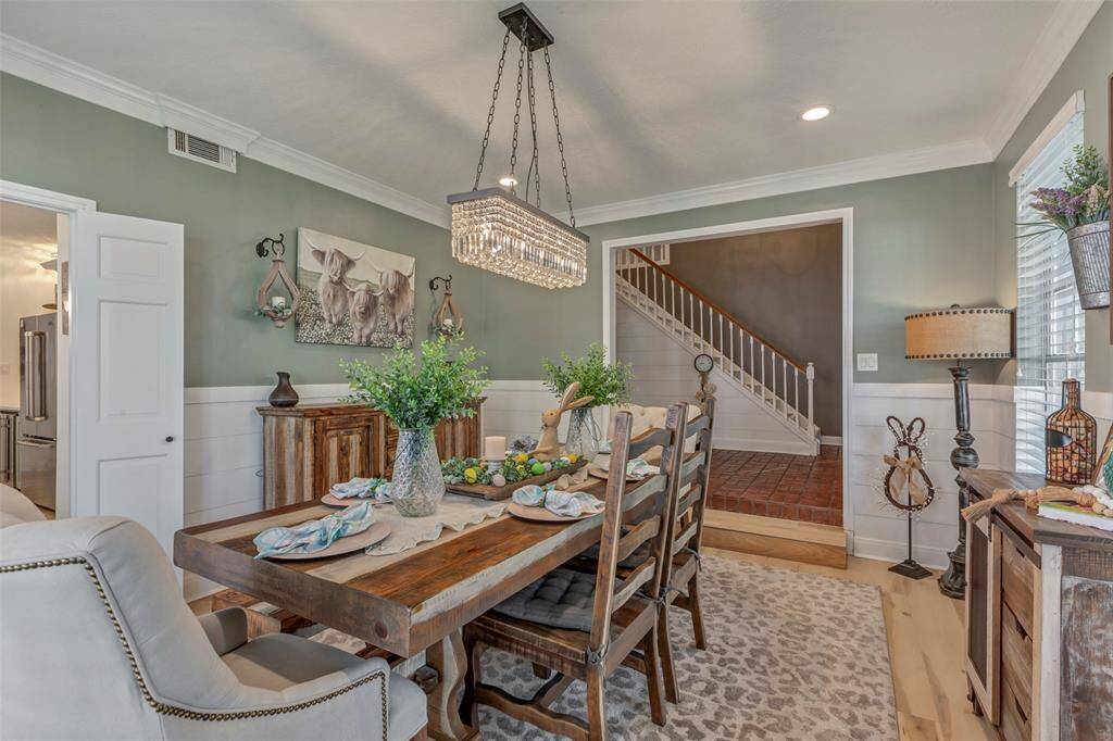 Formal dining open to kitchen.
