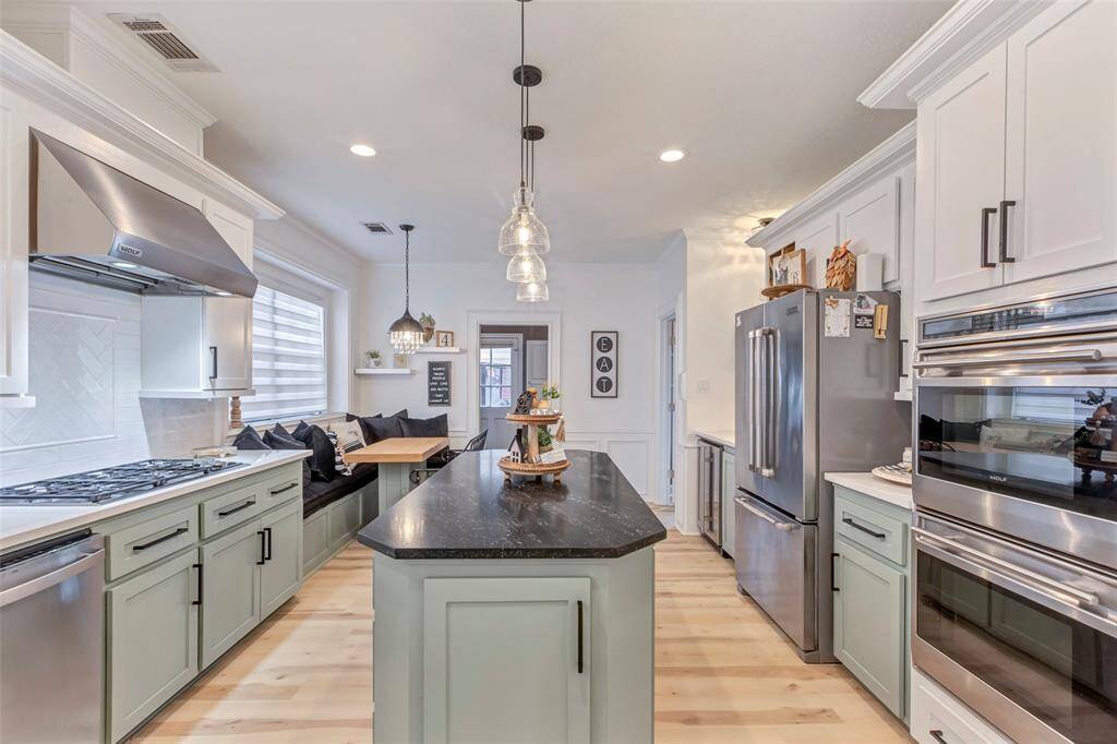 And what a kitchen!!  Large, oversized island, gas Wolf Cooktop, Vent hood, built in Microwave and oven.
