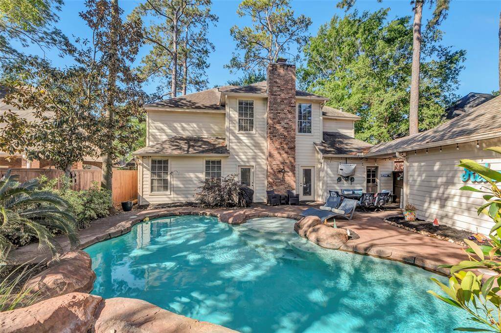 Nicely shaded pool and backyard.