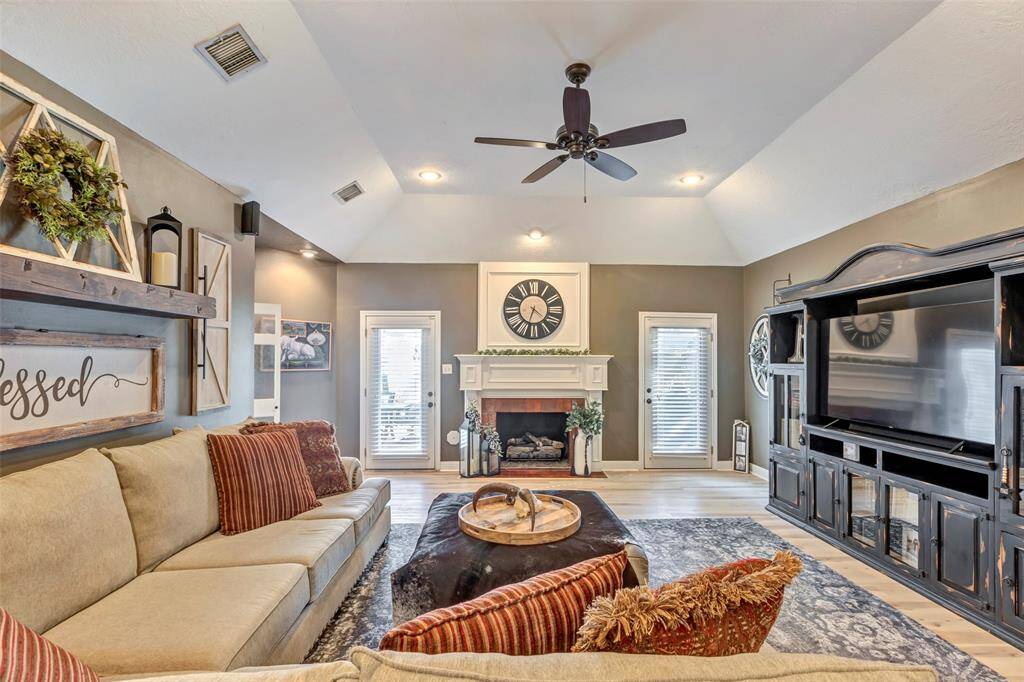 Amazing, oversized family room, fireplace and door to backyard.