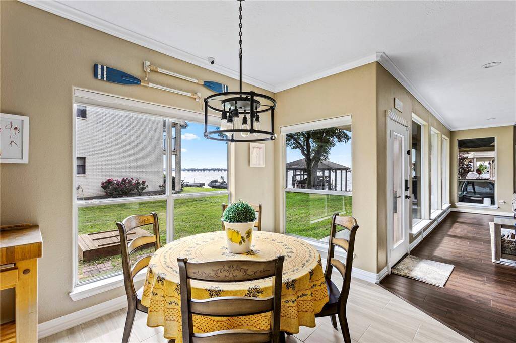 Breakfast room with updated light fixture.