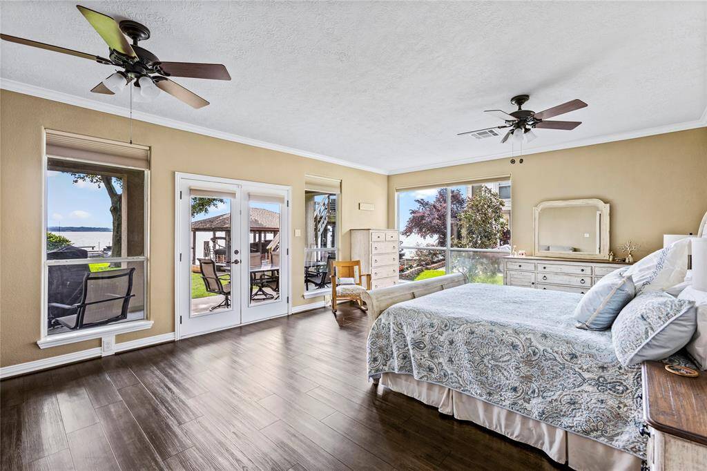 Enjoy the sunrise out of your primary bedroom. Windows galore to maximize all the views.