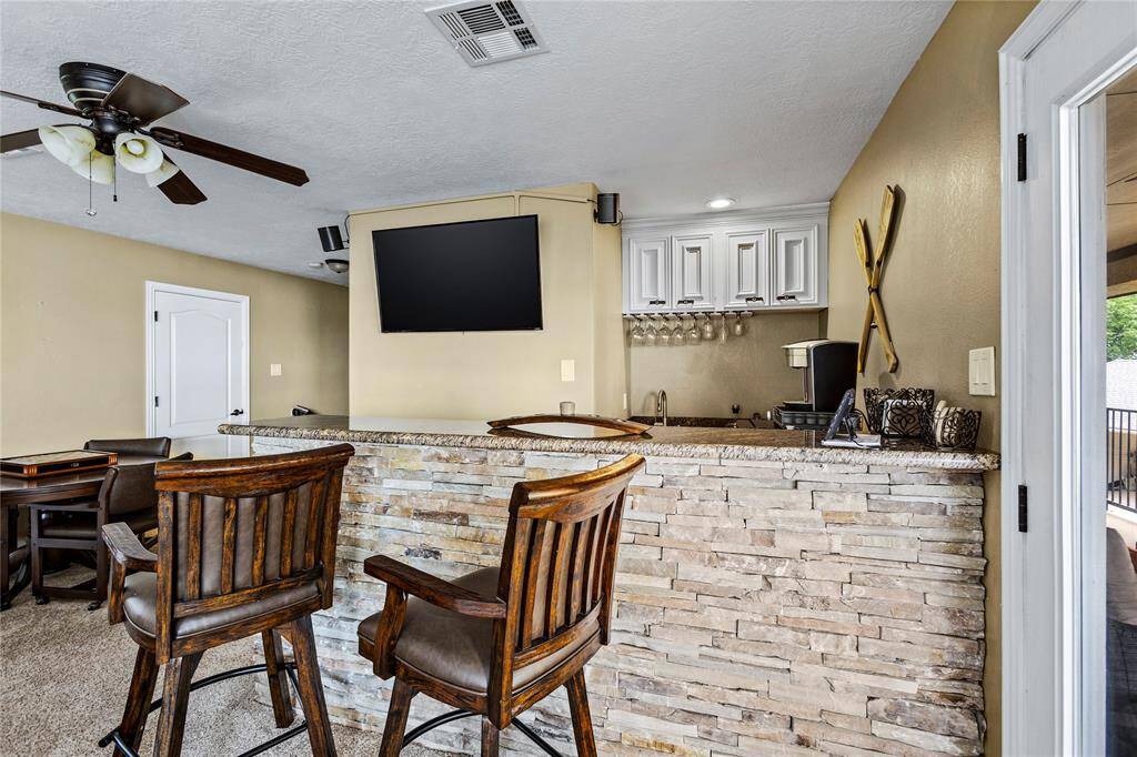 Wet bar located in game room, creating all the fun you imagine!