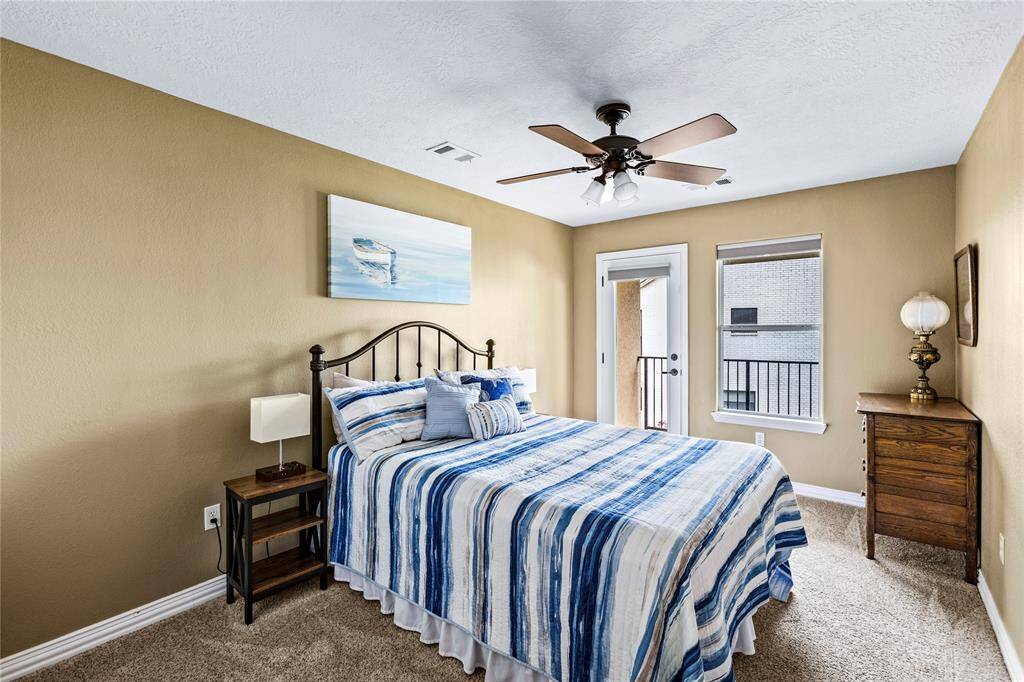 Secondary bedroom also with patio access.