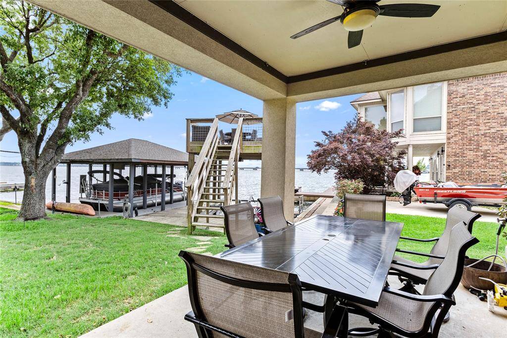 Downstairs covered patio, overlooking the water.