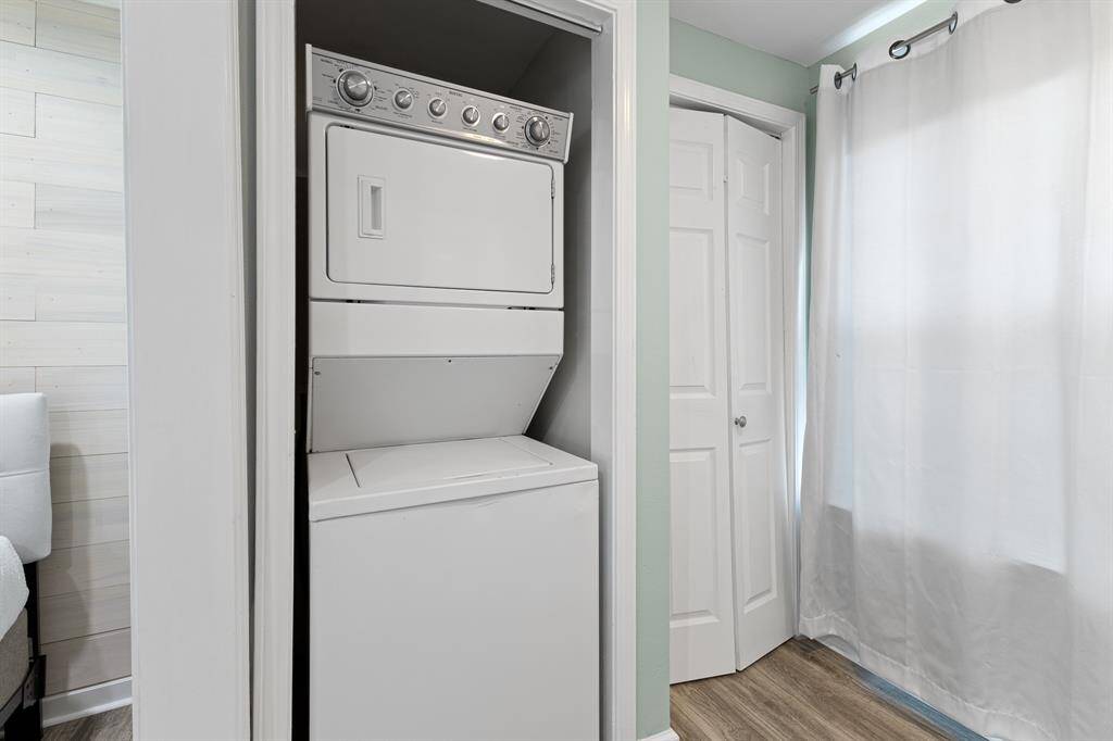 Stacked washer/dryer in primary bedroom - super convenient