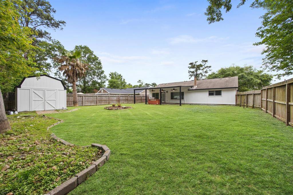 View of your yard, Home, and storage building,