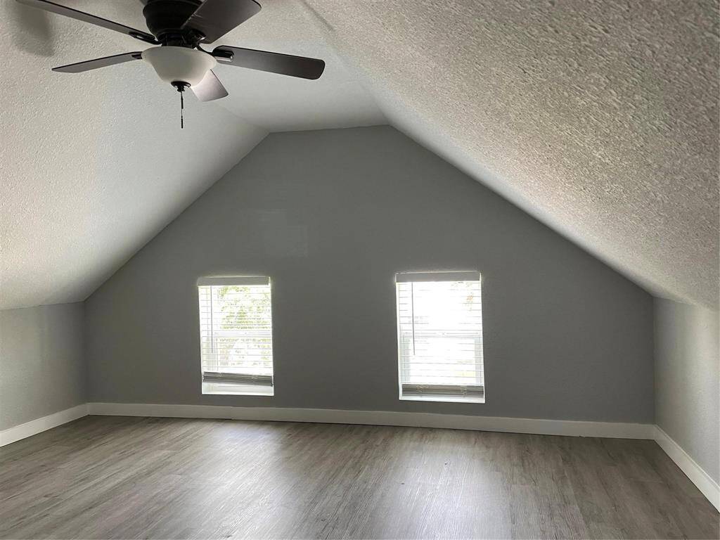 With ample natural light coming through these windows, you can enjoy time perched at the top of this unique home.