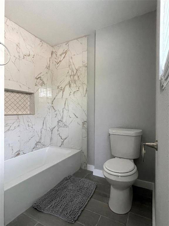 This full bathroom also has a window to allow for natural light and ventilation.