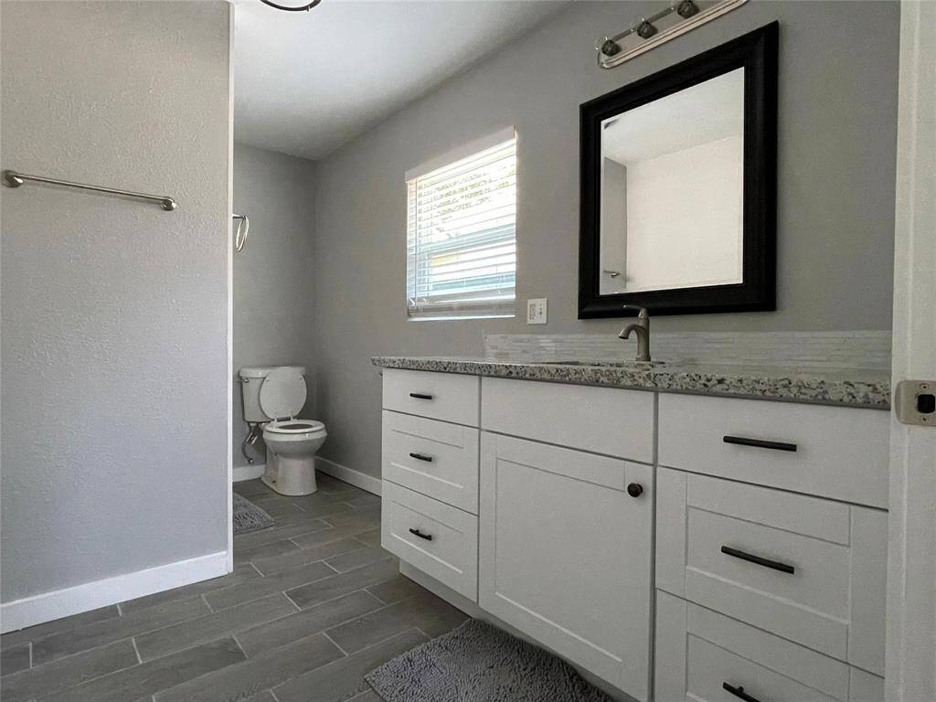 Enjoy the continued clean-lined aesthetic throughout the home into this beautiful full bath.
