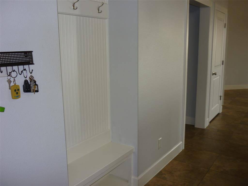 Coat hooks and cubby for shoes