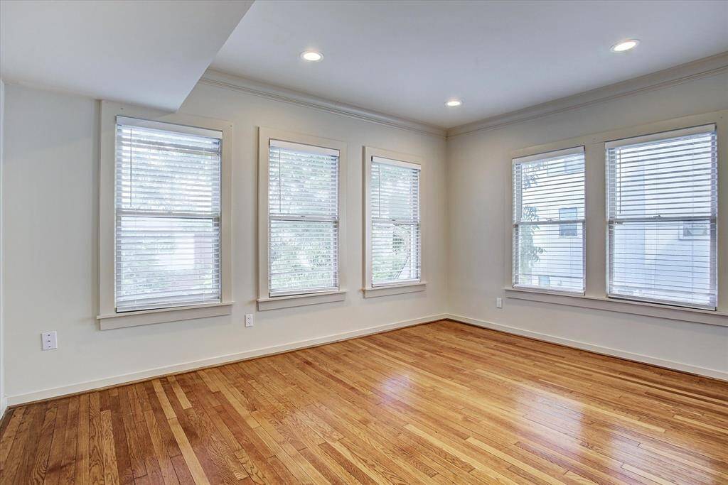Upper unit kitchen has stainless appliances and plenty of cabinet and countertop space.