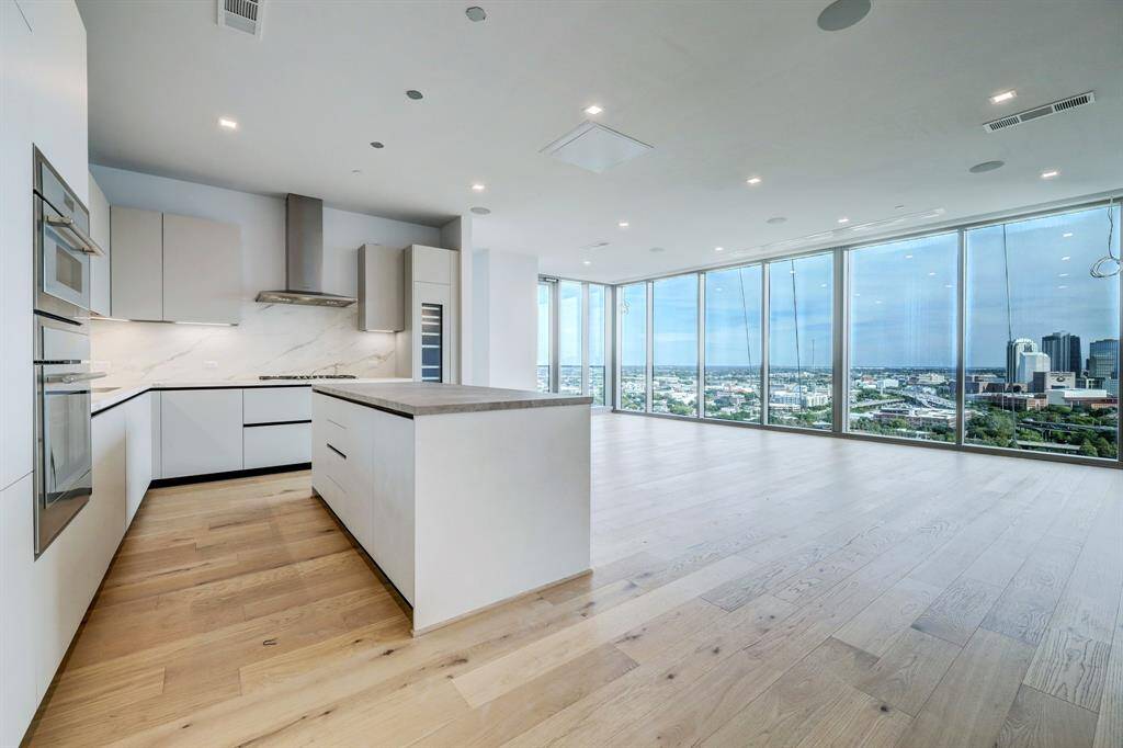 Kitchen features Pedini Italian cabinets, porcelain back spahses and counter tops. Plus Thermador applainces and separate wine refigerator.