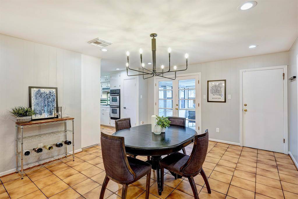 Dining room is plenty large enough for family dinners and entertaining friends.
