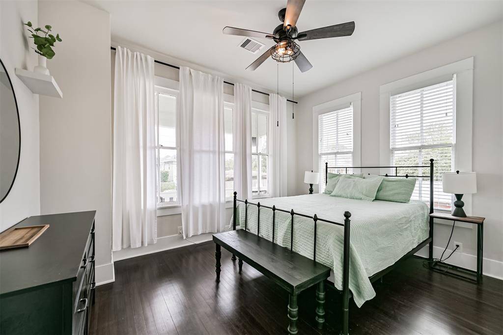2nd Floor bedroom overlooking the street. A good look at the beautiful floors