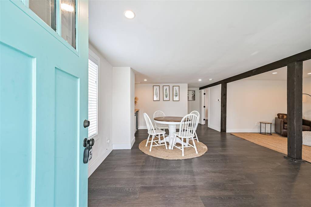 1st floor entry into the large open area that could be used as a second living area or an entertainment space.
