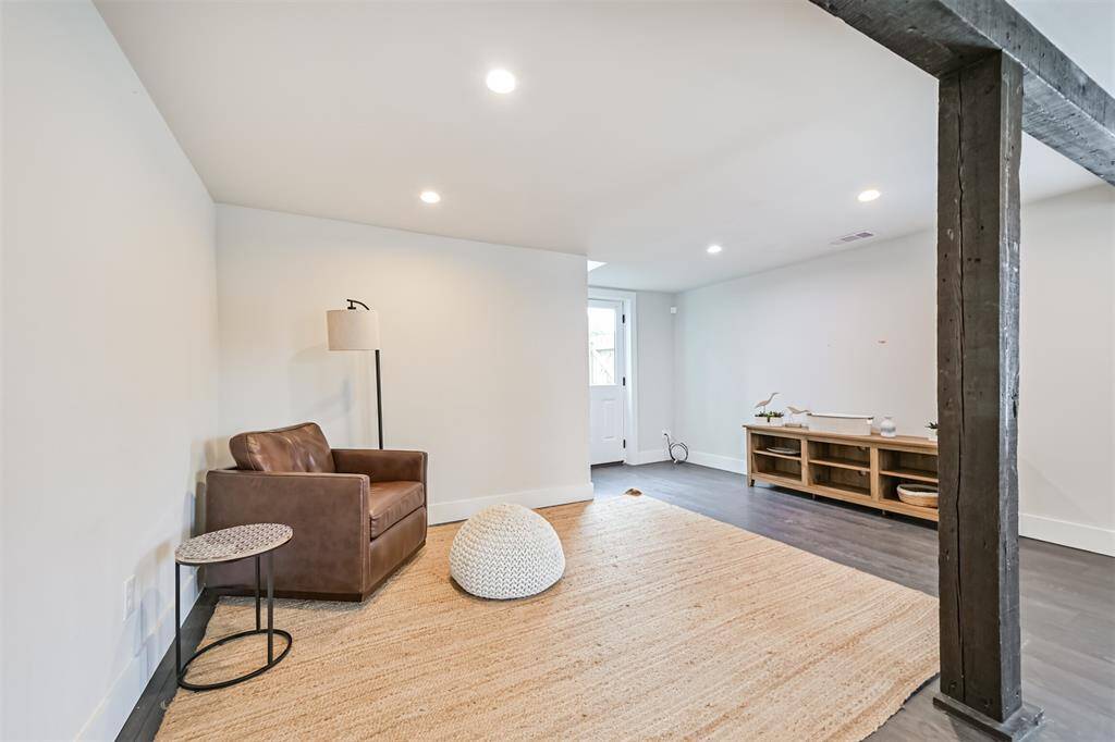 Other side of the large open downstairs area with many possible uses.