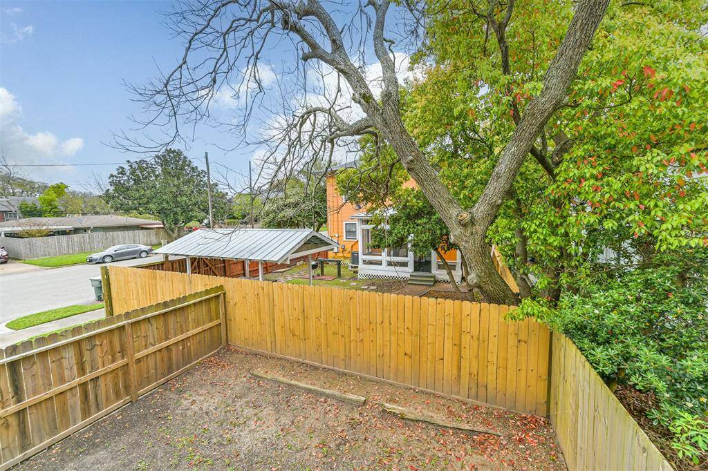 A view into the first side yard from the top of the stairs coming out of the mudroom.