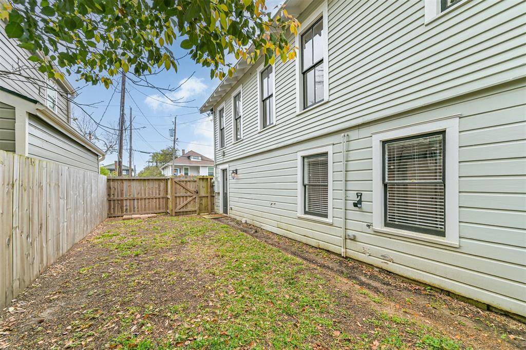 Another angle of side yard #2 to the right of the house.