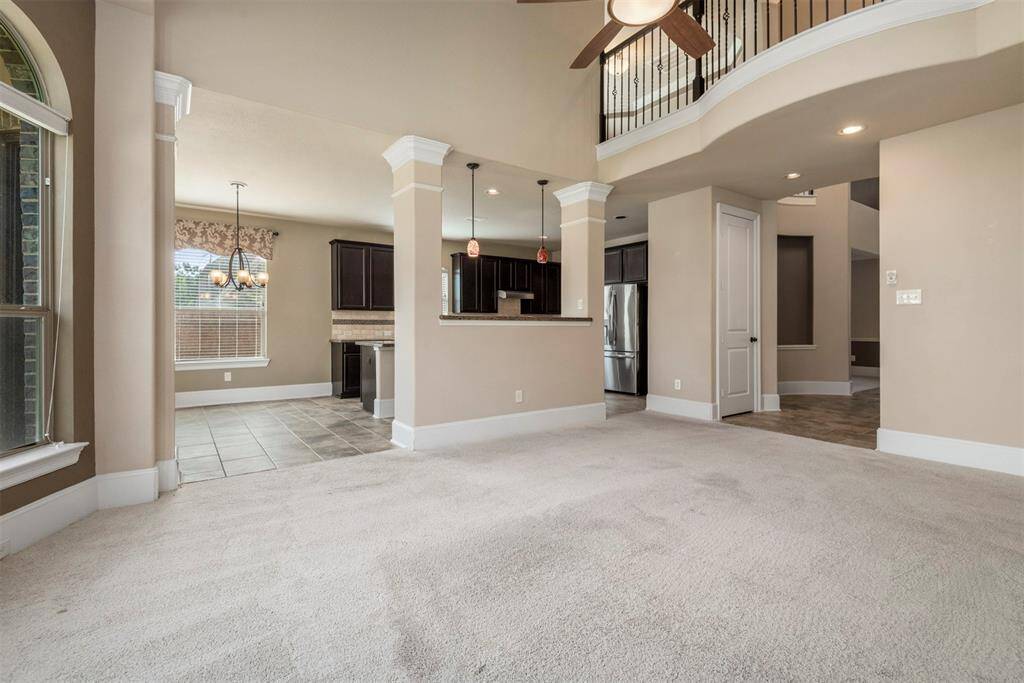 Family room open to kitchen. The extra counter space between the 2 rooms makes the perfect serving area when entertaining.