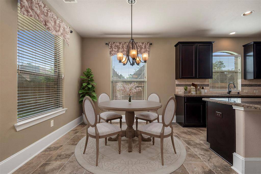Casual dining area in the kitchen. Virtually staged.