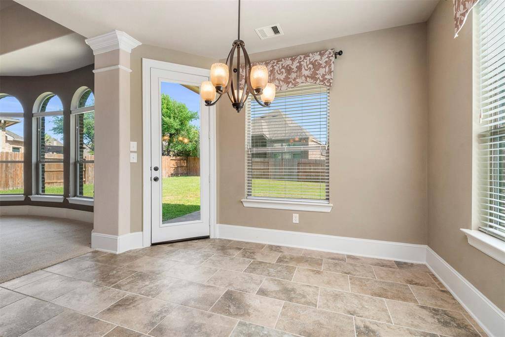Casual dining area in the kitchen with access to the covered patio.