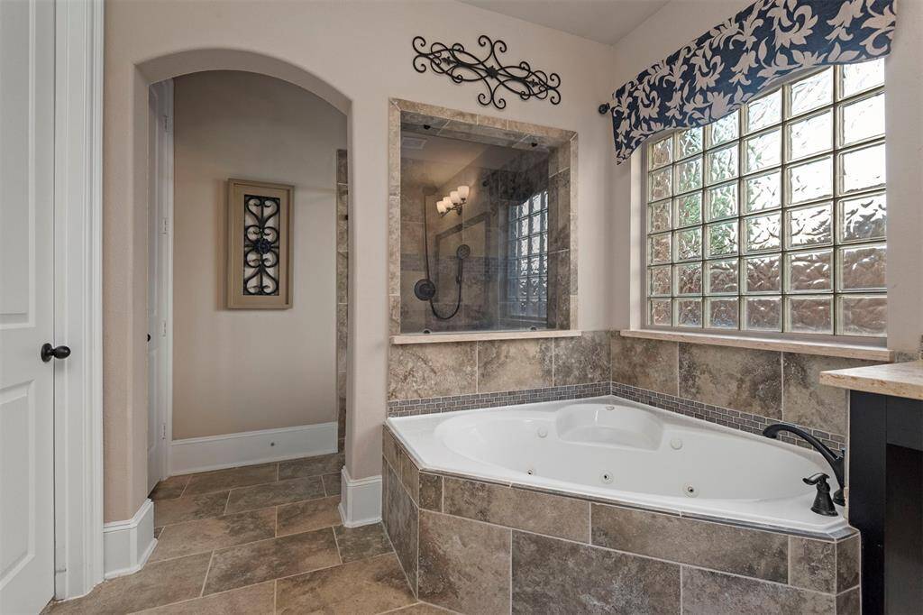 Jetted tub with seat.