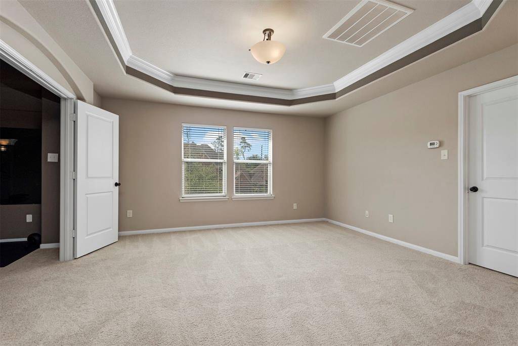 Game Room upstairs with view of the media room to the left.