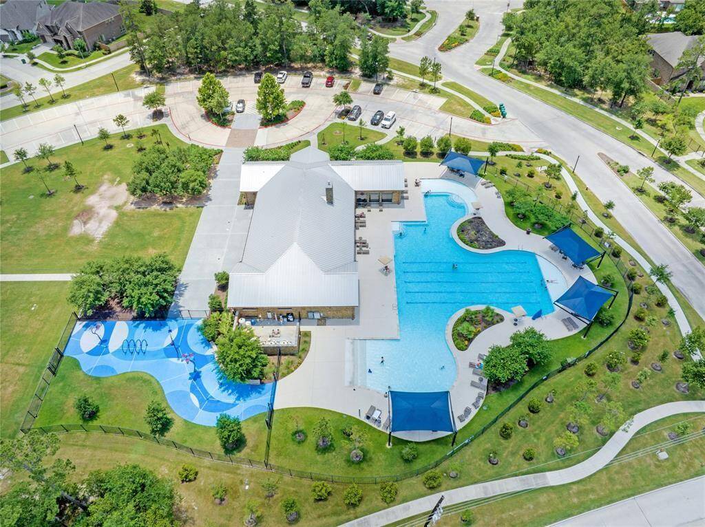 One of the community pools with splash pad, gym, clubhouse and playground.