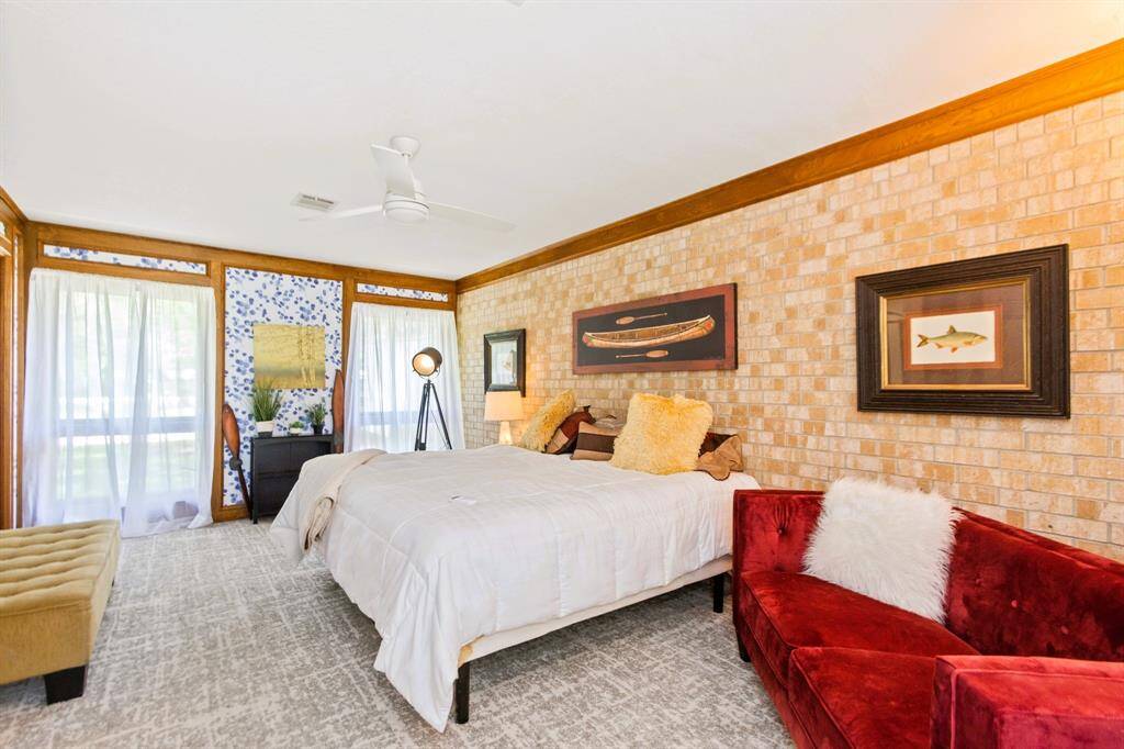 Bedroom 4 is spacious and bright, filled with natural light that creates an inviting and airy atmosphere.