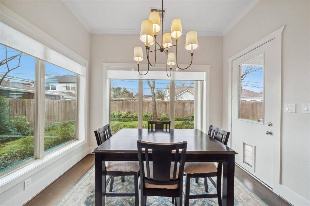 This entire home is bathed in beautiful natural light, streaming through massive double-paned windows, creating a bright and inviting atmosphere throughout.