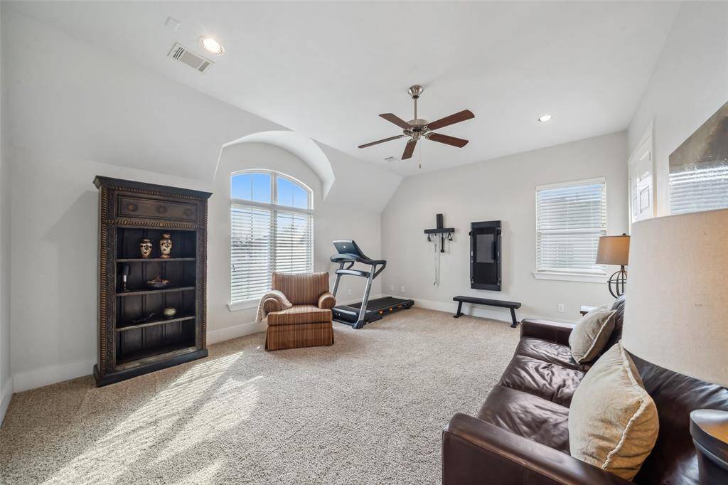 The large game room features doors that fully shut, creating a private retreat where you can truly get away from it all. Whether for entertainment, work, or relaxation, this space ensures peace and quiet—no one will hear you in here!