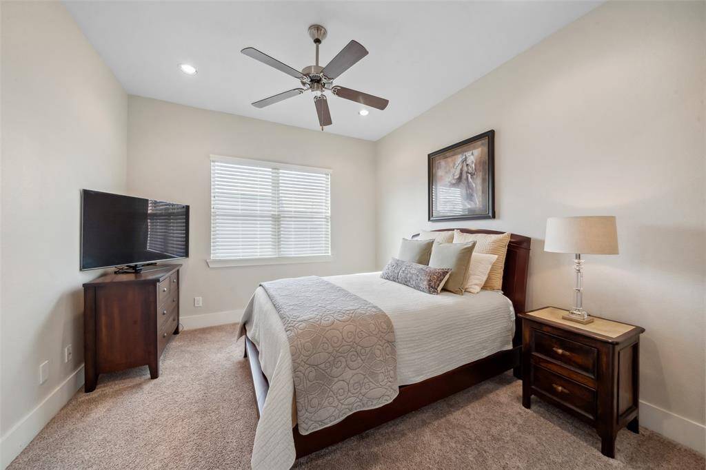 The fourth bedroom, which is actually another private ensuite, offers a spacious layout and a full bath with a tub/shower combo, providing comfort and convenience for guests or family members.