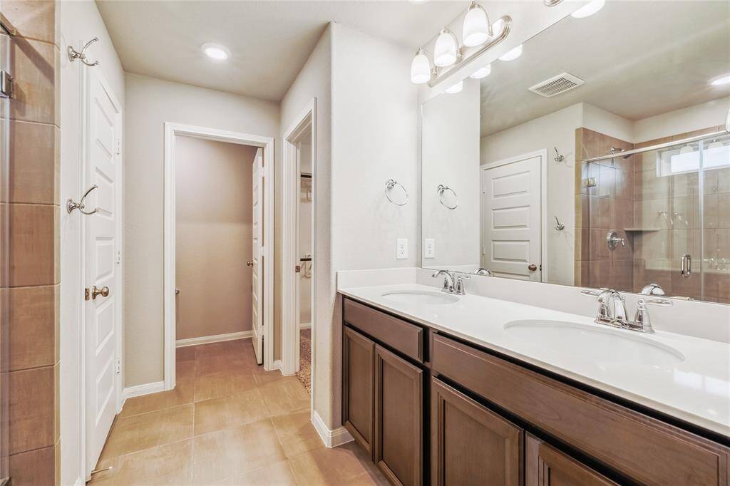Primary bath with double vanities.