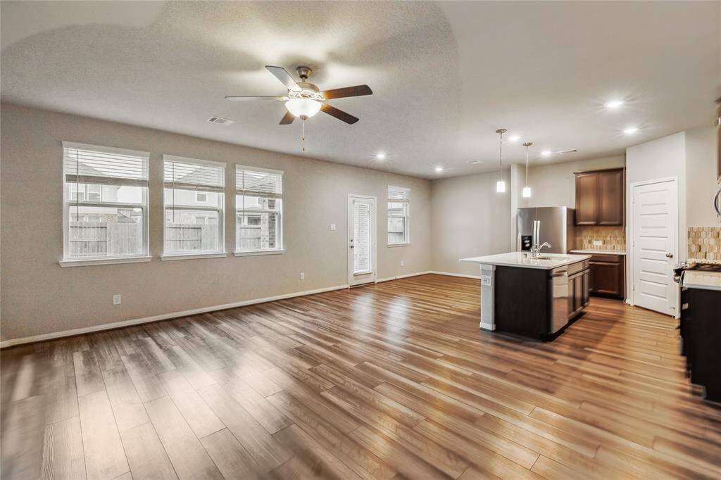 Family room overlooking the kitchen and breakfast area.
