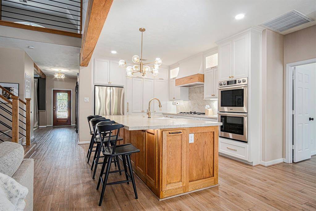 Wonderfully refreshed kitchen complete with Dacor appliances.