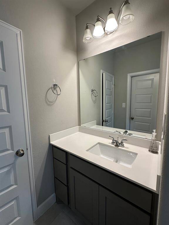 Secondary room with vanity sink