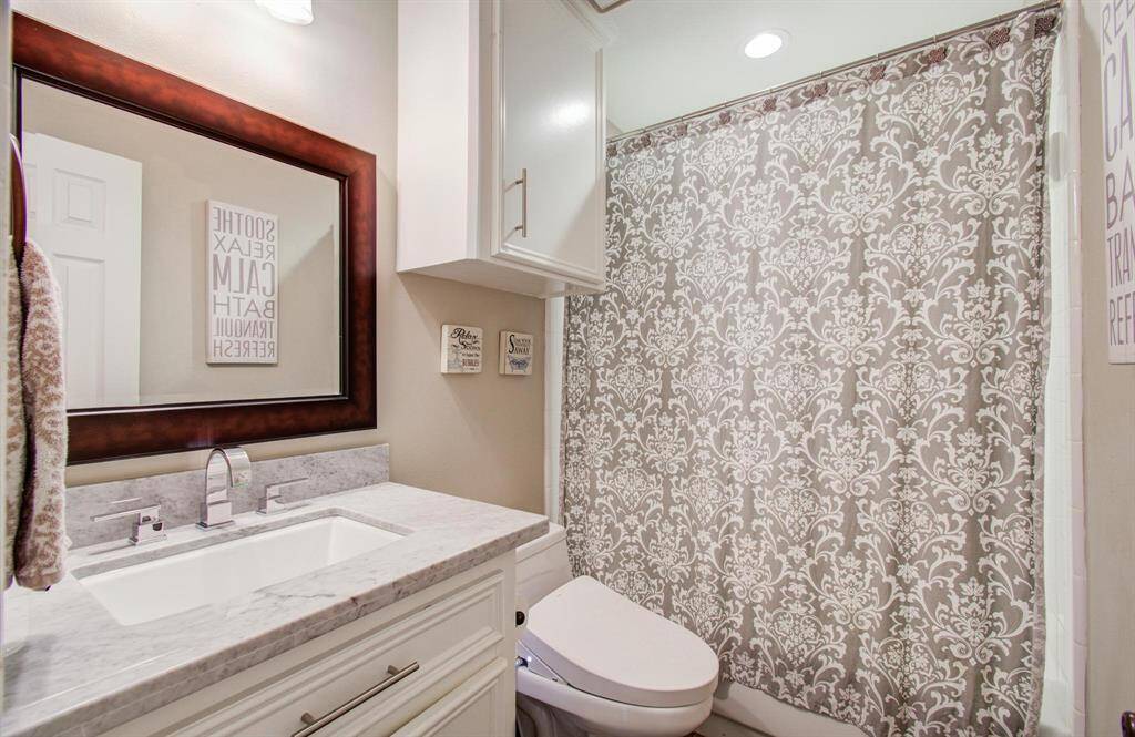 Full bath located at the front of the house. (Toto toilet seat/bidet excluded)