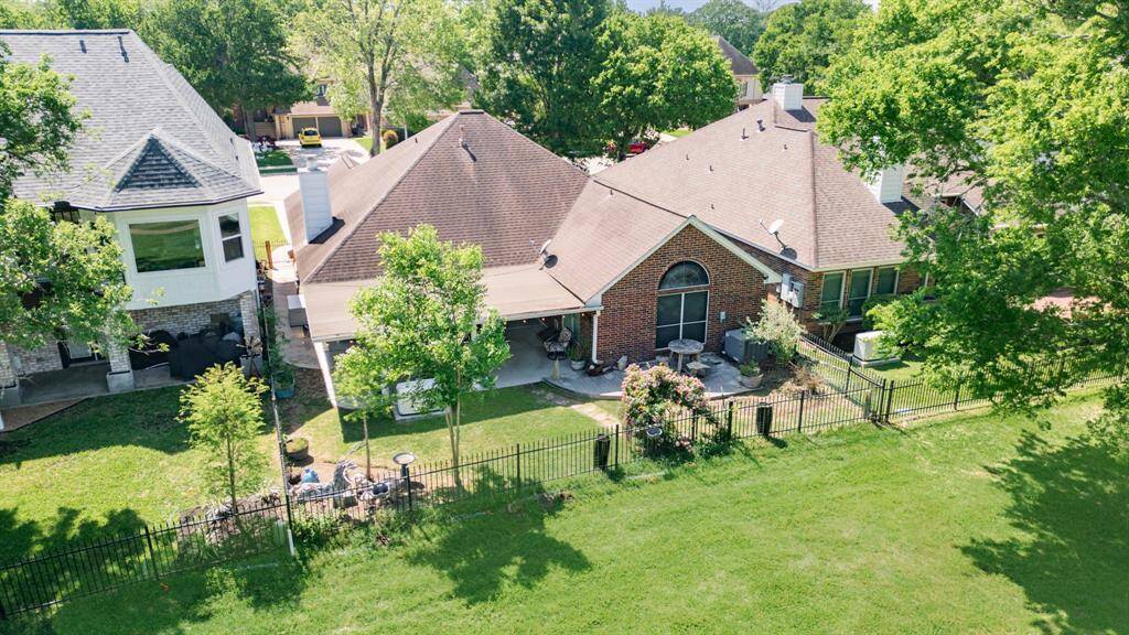 Aerial view of the home from the golf course.