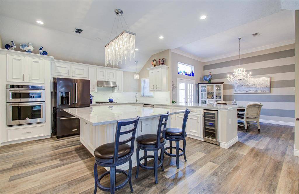 Seating at the island - additional stools can fit comfortably on the left side as well!
