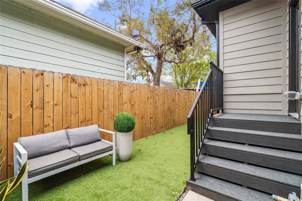 The backyard space has been artificially turfed and pet resistant to for daily use.