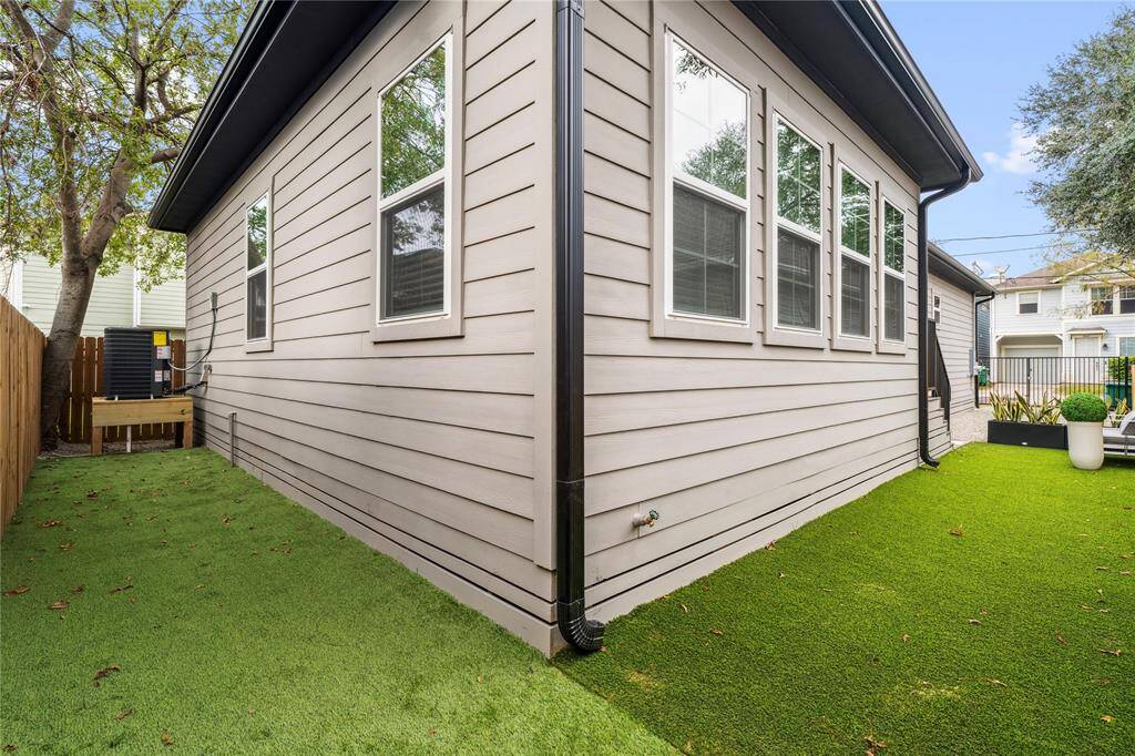 Another view of the spacious backyard space perfect for pets.