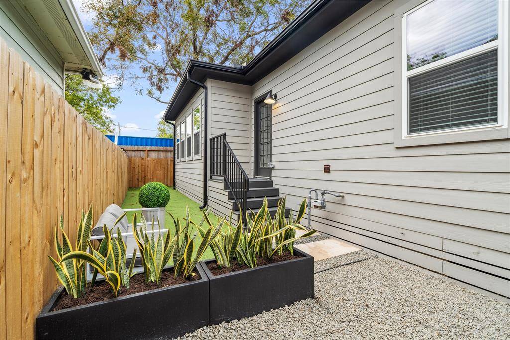 The backyard space features, a quiet retreat whether entertaining, or for relaxation.