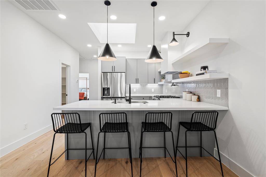 The island is perfect for entertaining guests and can accommodate up to four seats.